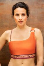 Woman with an orange bikini top